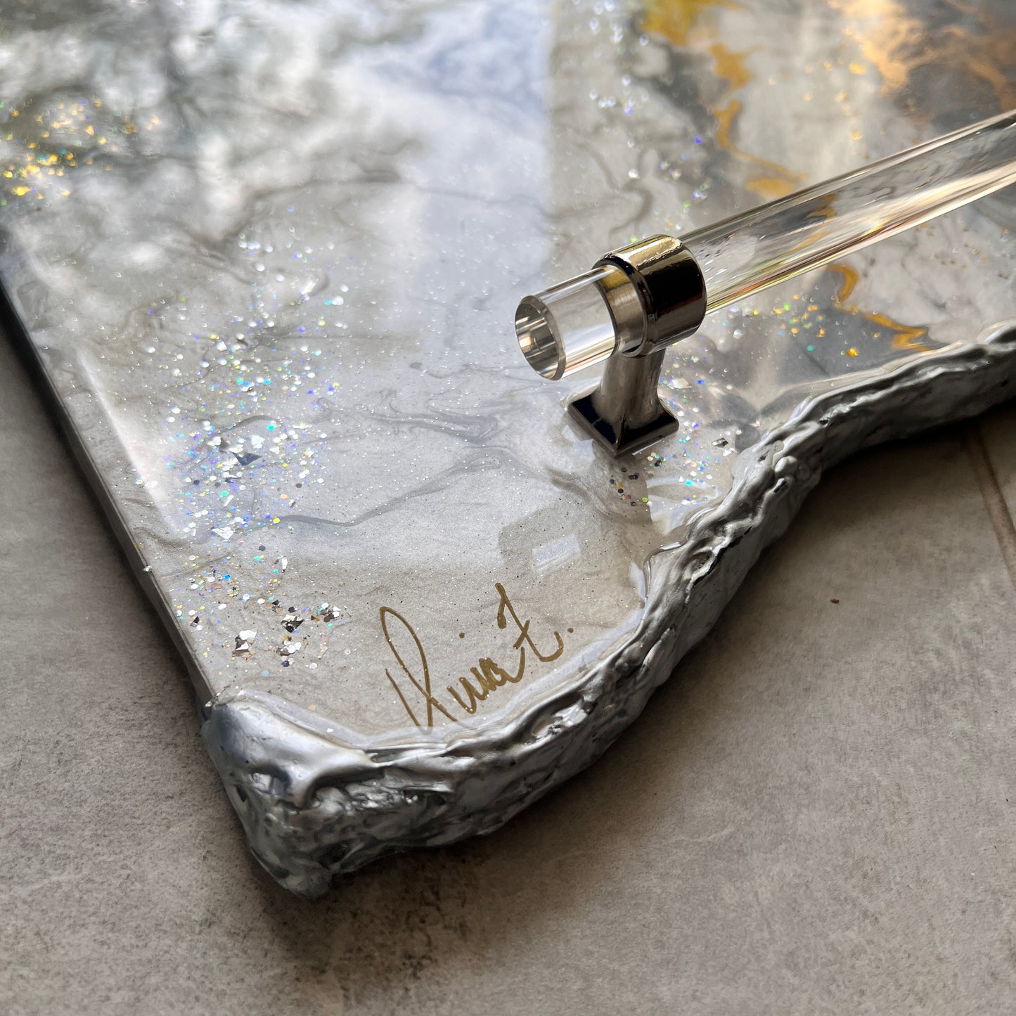 Neutral luxury tray with silver lucite handles