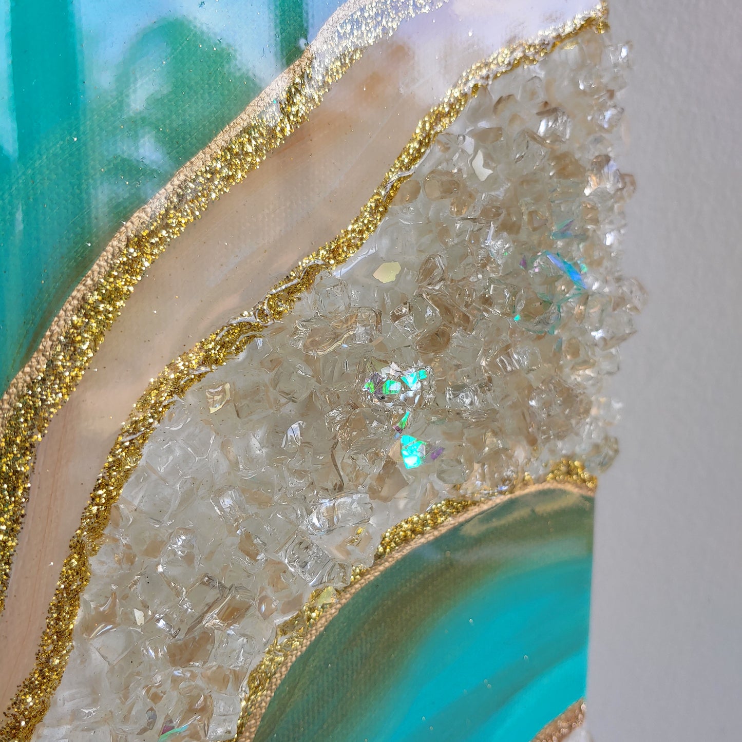 Turquoise and caramel geode artwork with glass and crystals