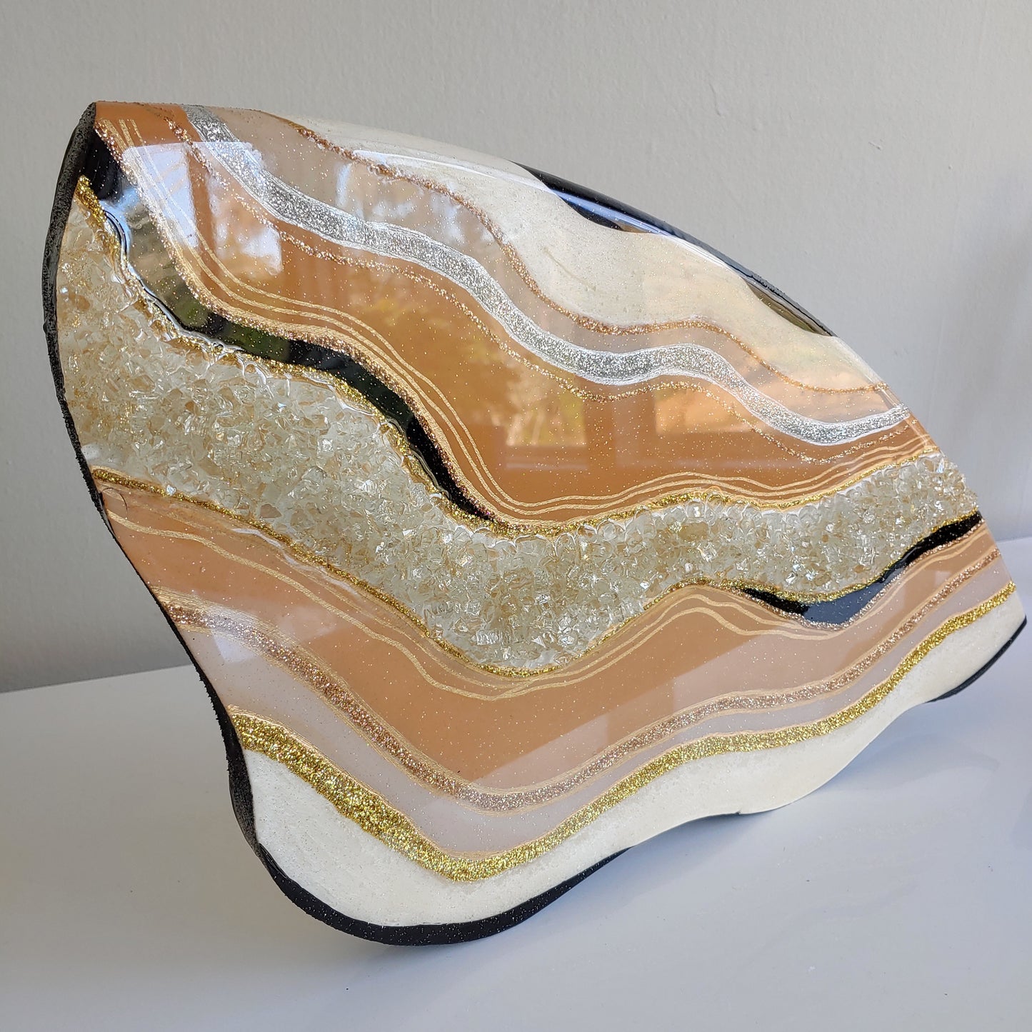 Curvy cream, black, resin, crushed glass artwork on wood